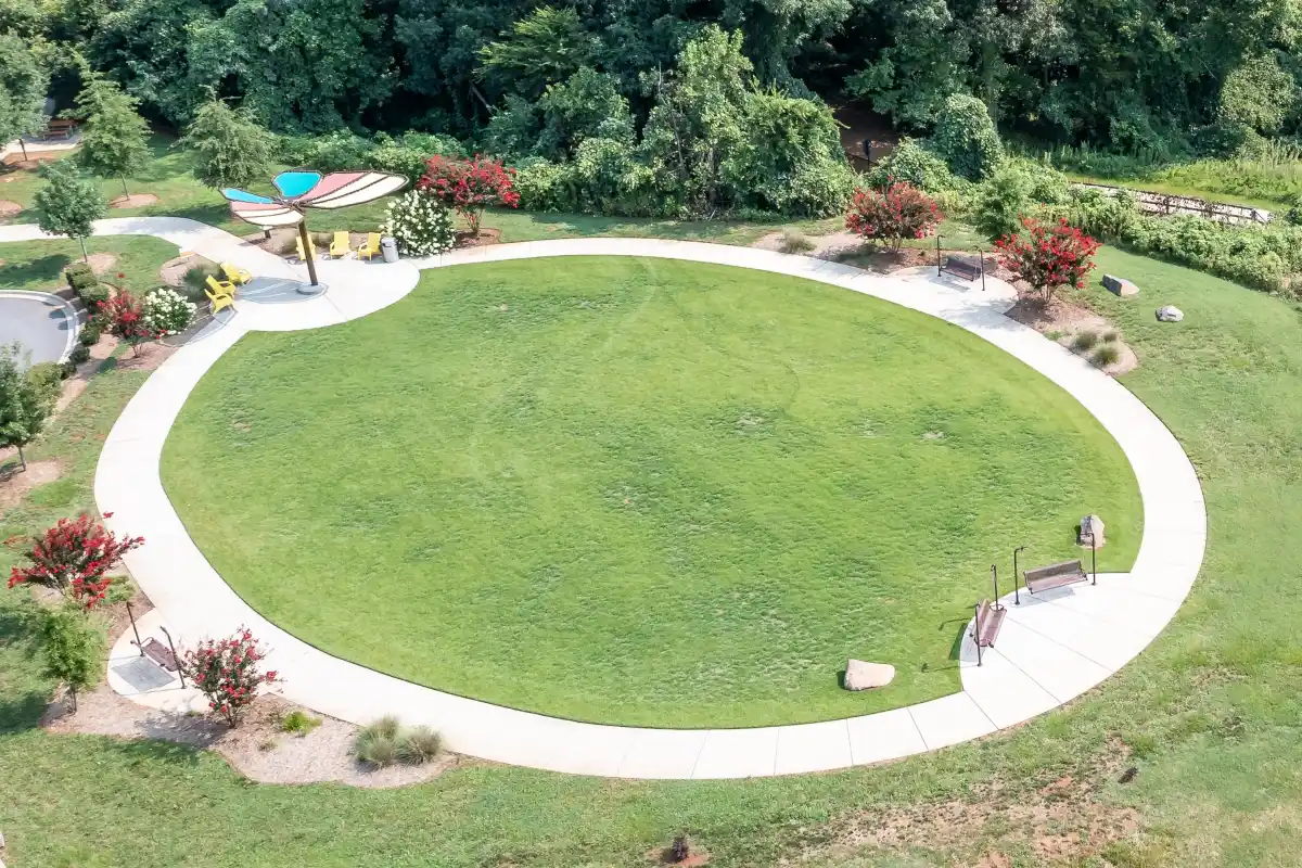 Aerial view of the walking oval and butterfly-shaped shade structure at Rosedale Nature Park in Huntersville