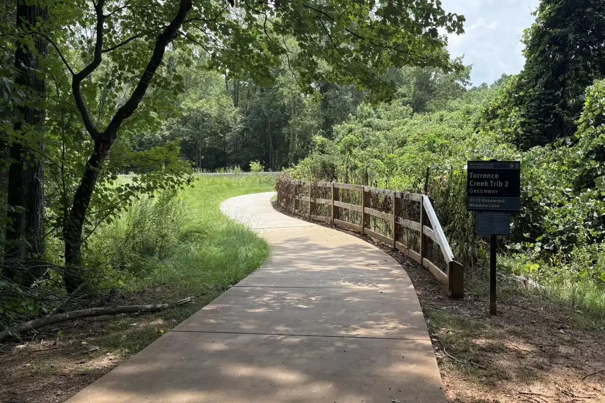 Paved trail connecting Rosedale Nature Park to the Torrence Creek Greenway