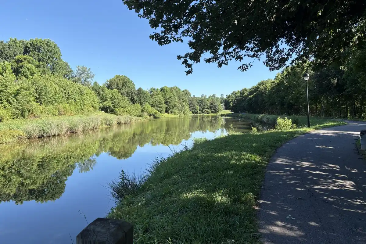 McDowell Creek Greenway path running along a lake