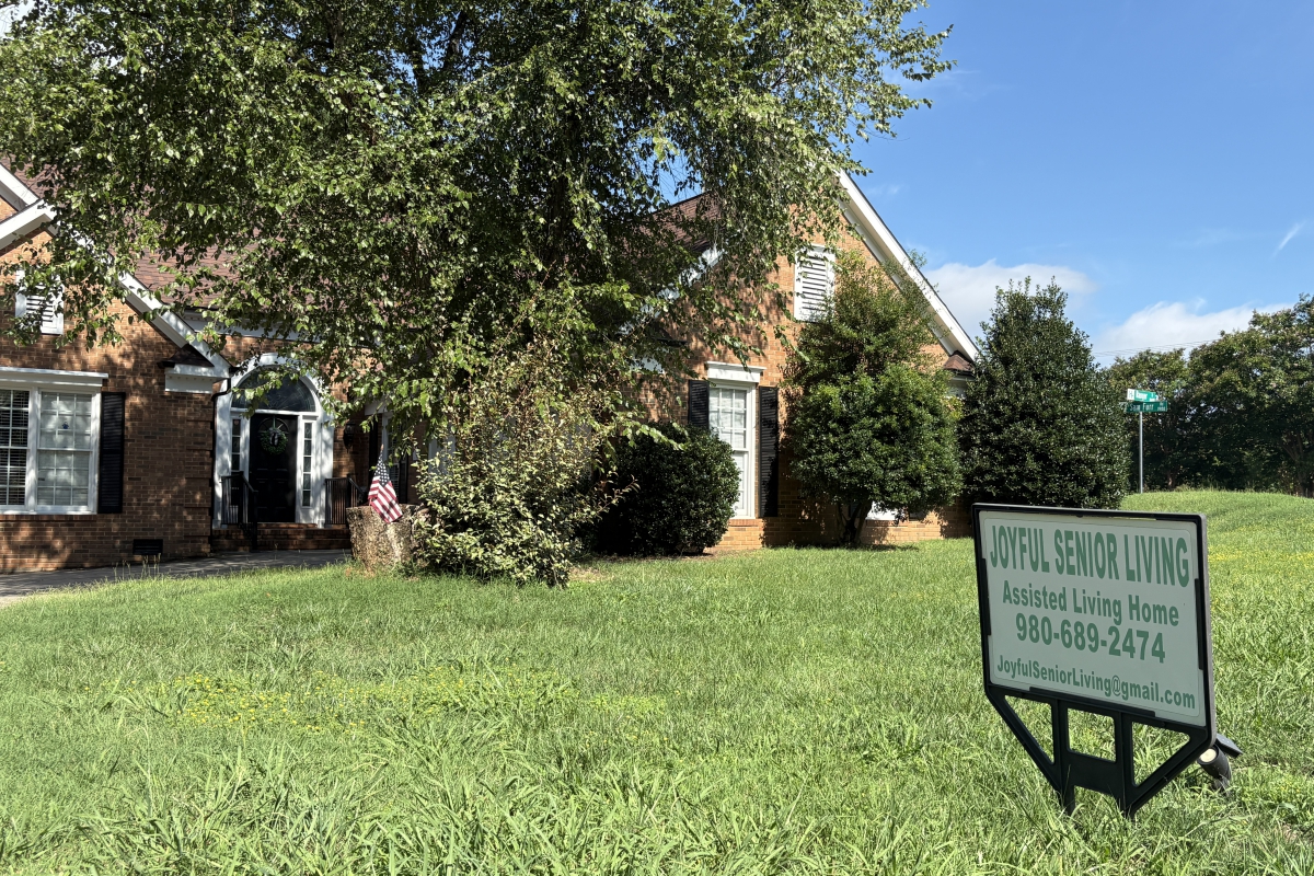 Joyful Senior Living home and sign in the yard