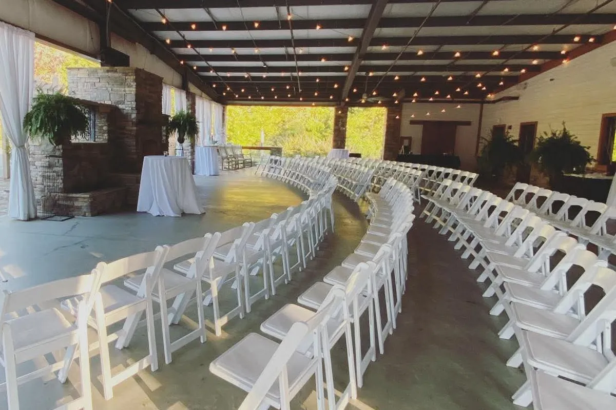 Outdoor covered patio area with arc of seats at Magnolia Woods