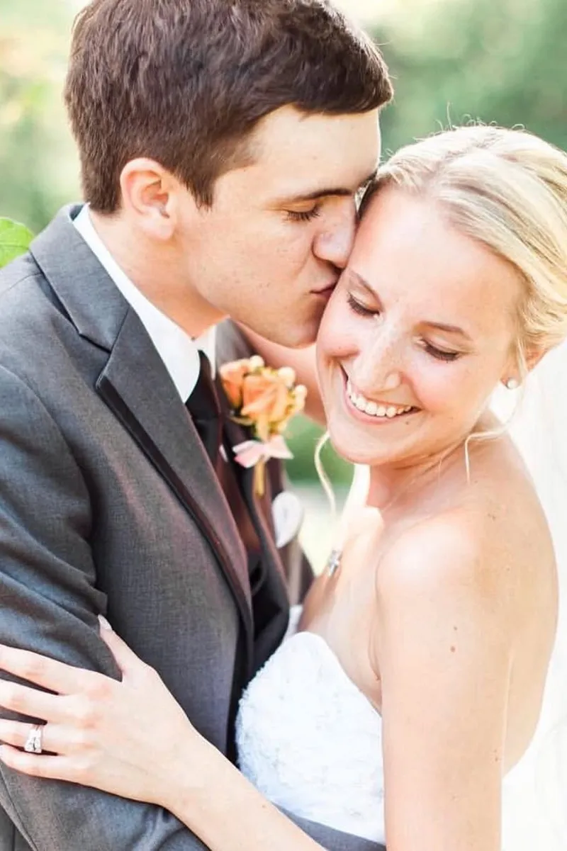 Newlywed couple embracing 