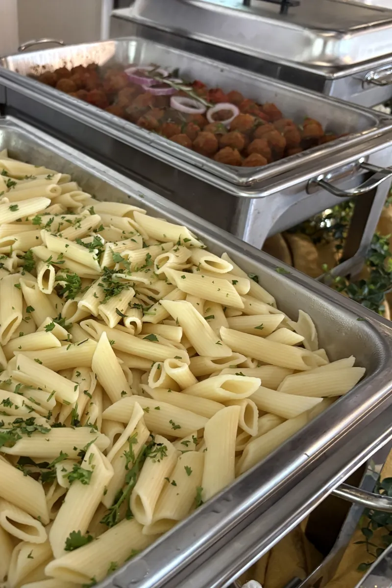 Penne pasta and meatballs from a Savory Moments Catering buffet