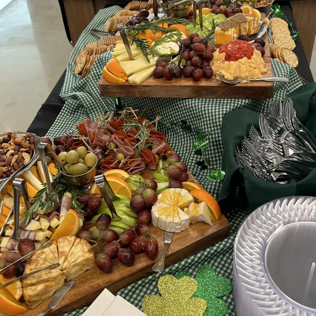 Grazing board with cheese, meats, and fruit from Savory Moments Catering
