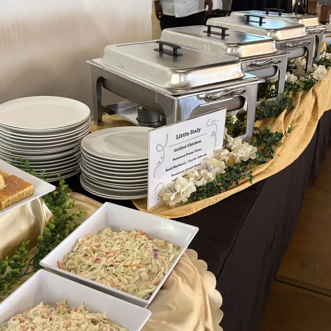 Little Italy buffet station with cornbread and coleslaw from Savory Moments Catering