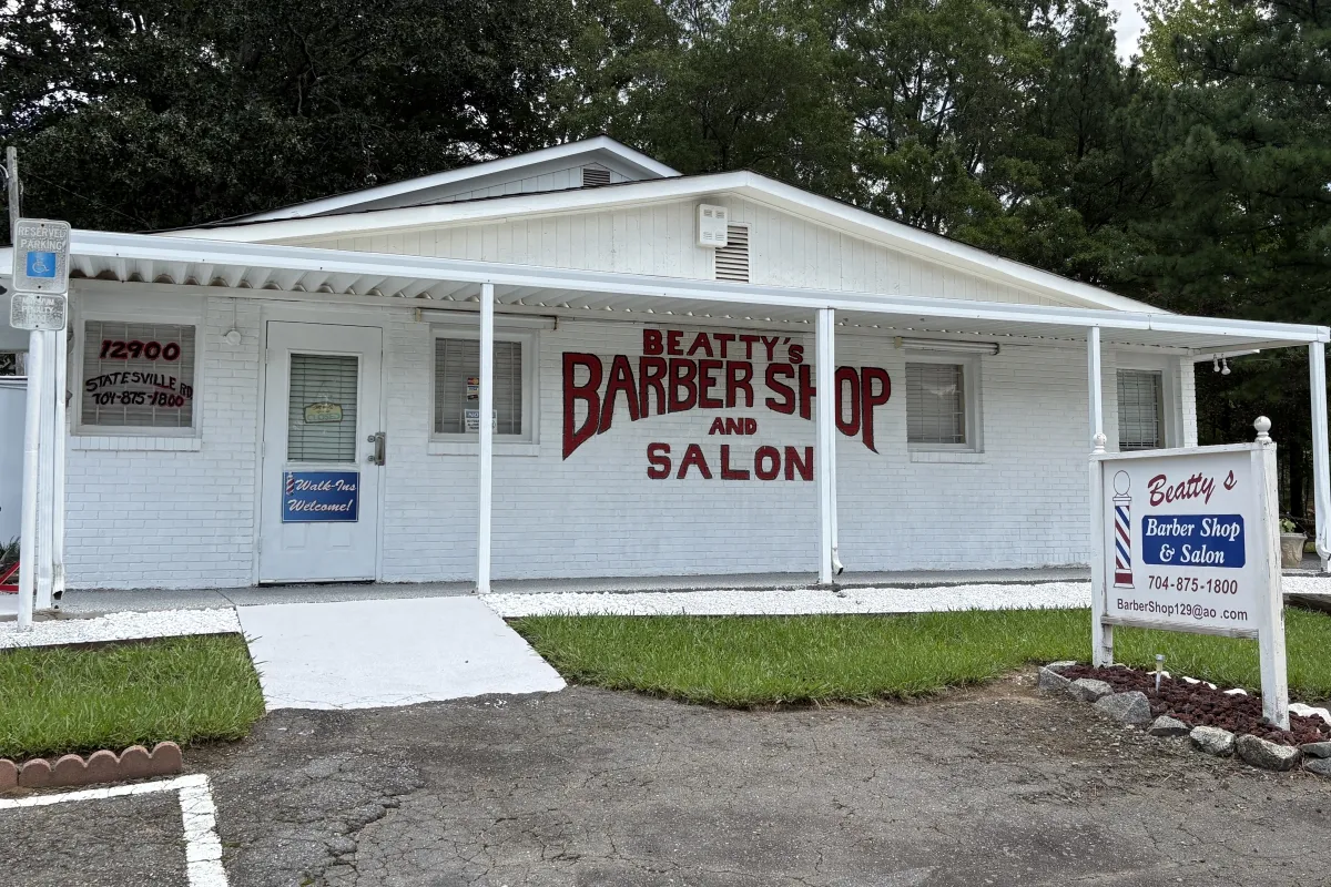 Beatty's Barber Shop & Salon building and sign