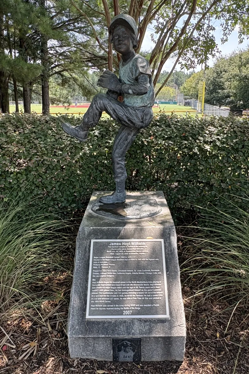 Bronze statue of a young pitcher honoring Hoyt Wilhelm at Huntersville Athletic Park