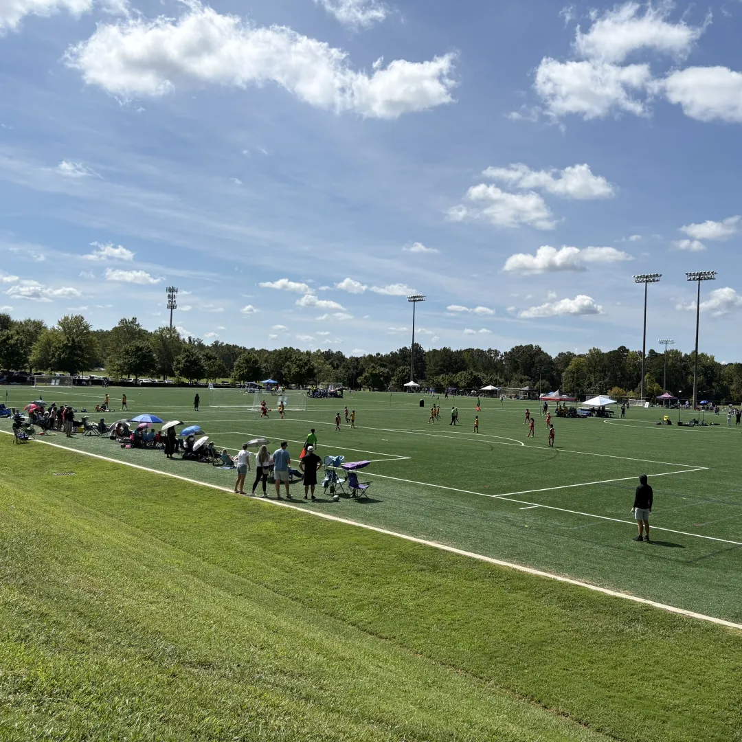 Soccer game on turf field at Richard Barry Memorial Park
