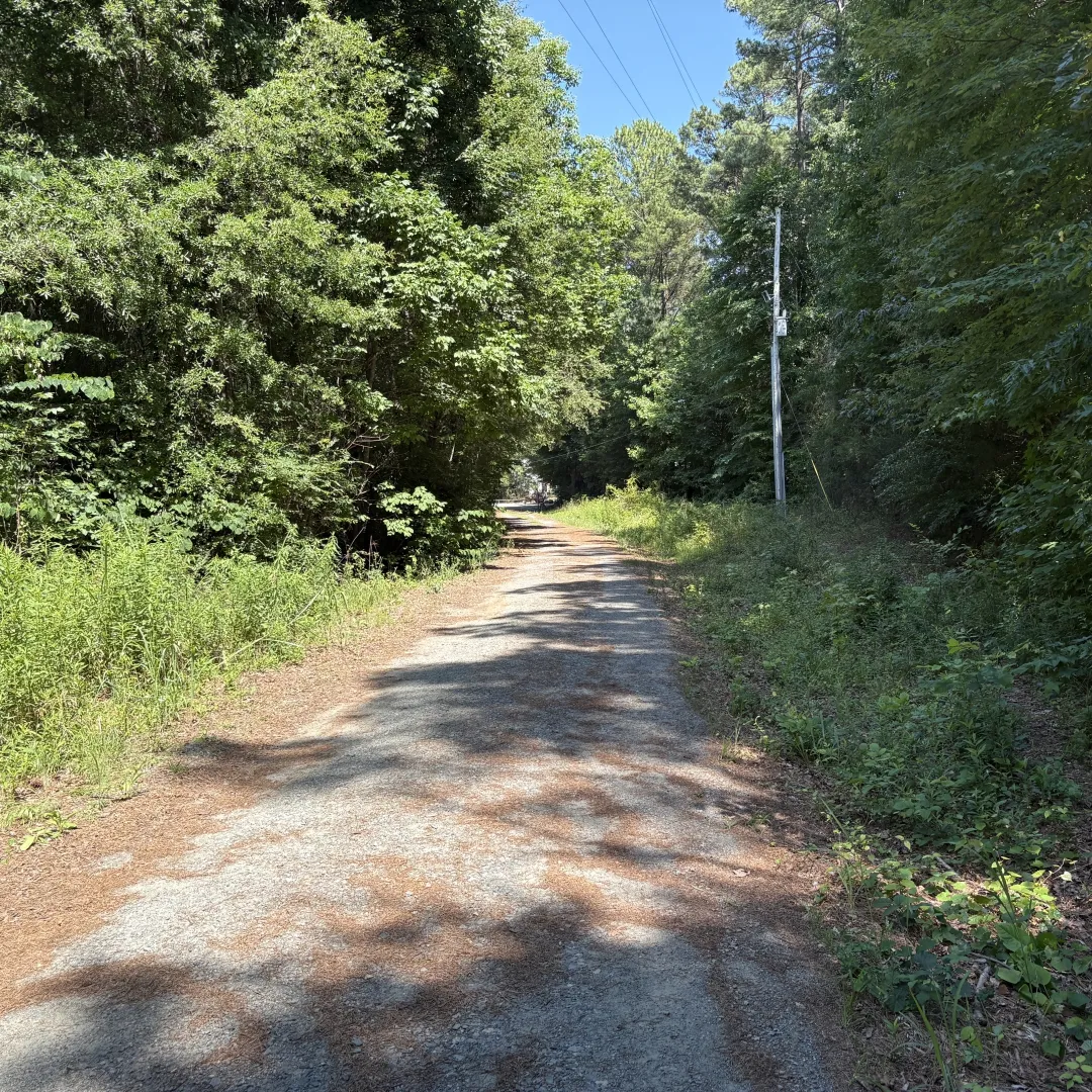 The gravel access road connecting the two entrances at Buckeye Cove Nature Preserve