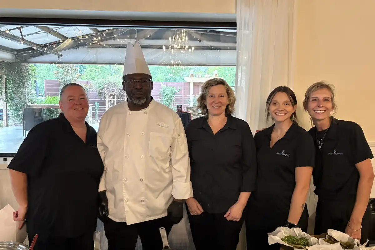 Owner Jodi, executive chef Yoube, and three staff members