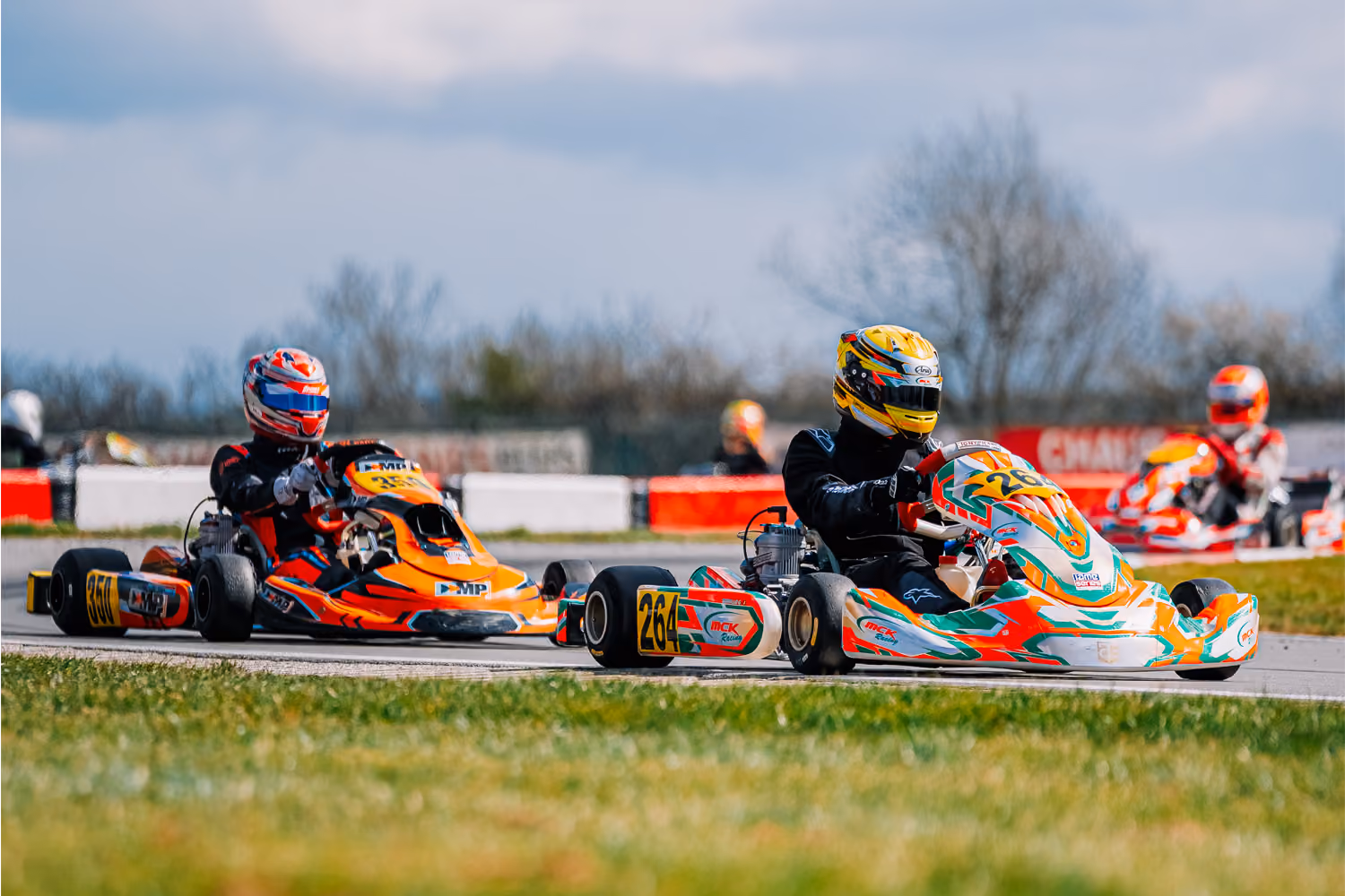 MCK Racing driver leading a group of karts in Mariembourg