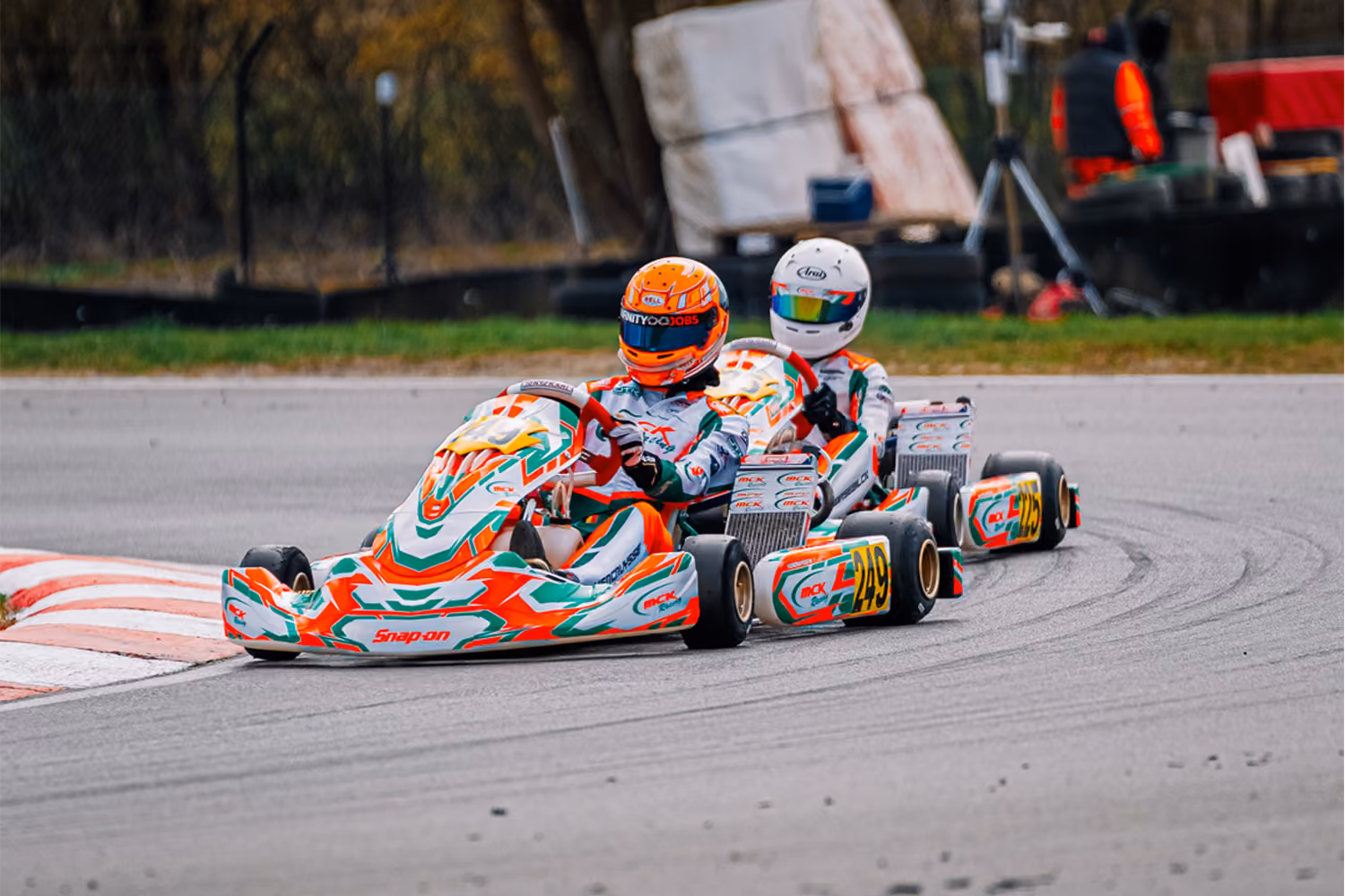 Two MCK Racing karts through a corner in Mariembourg