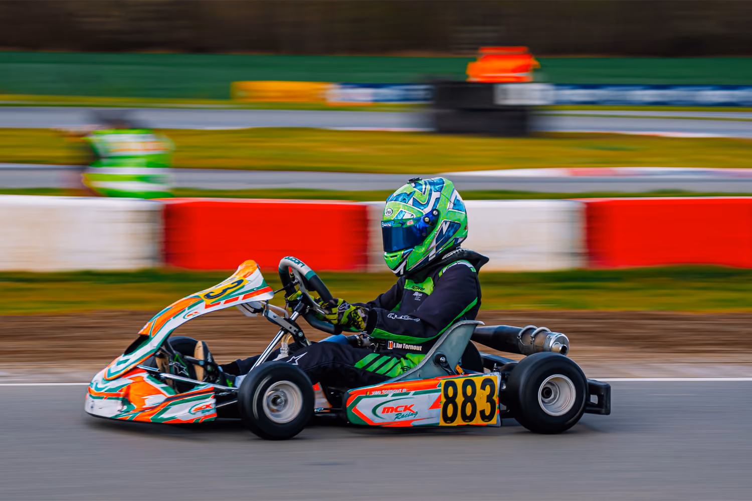 MCK Racing kart number 883 at speed in Mariembourg