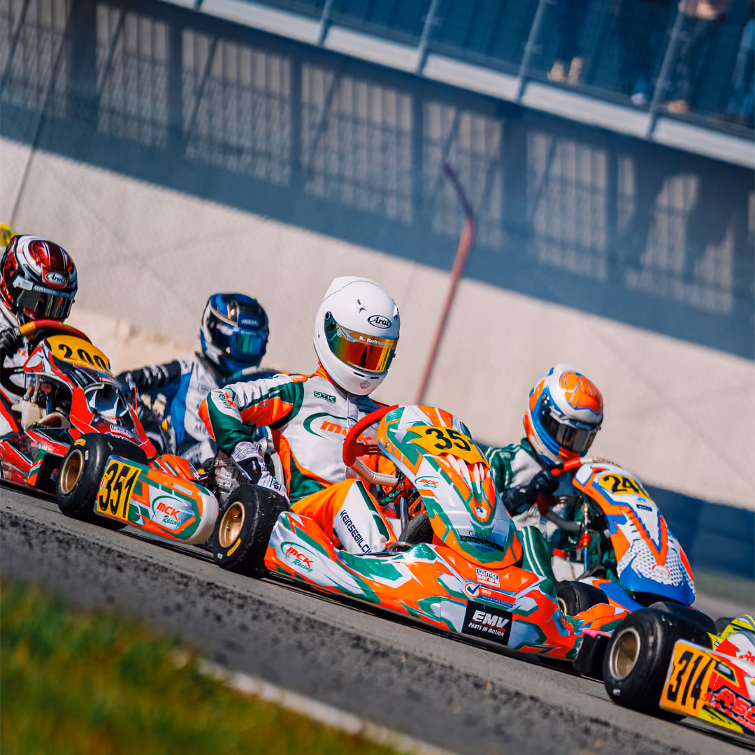 Karts lined up on the grid before the start in Mariembourg
