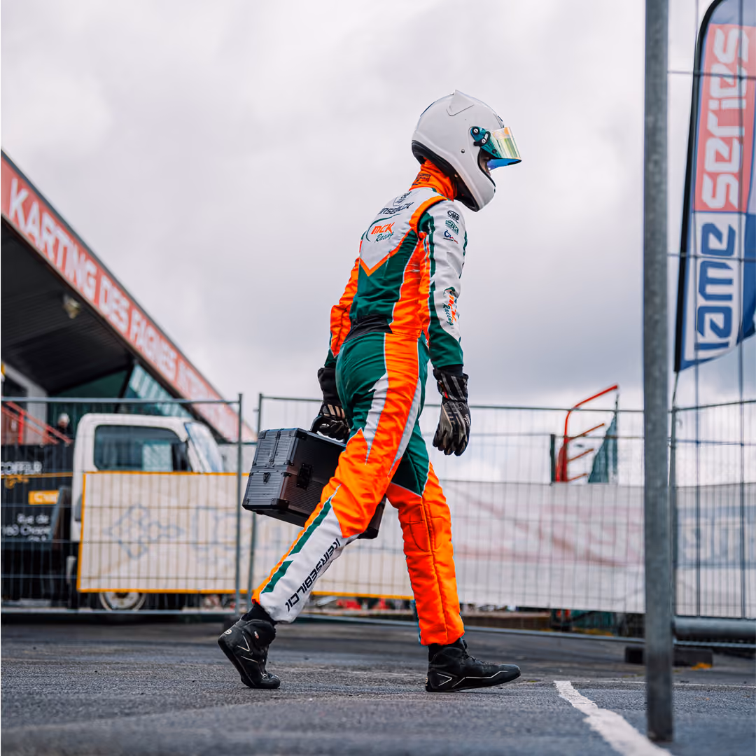 MCK Racing driver walking through the paddock in Mariembourg