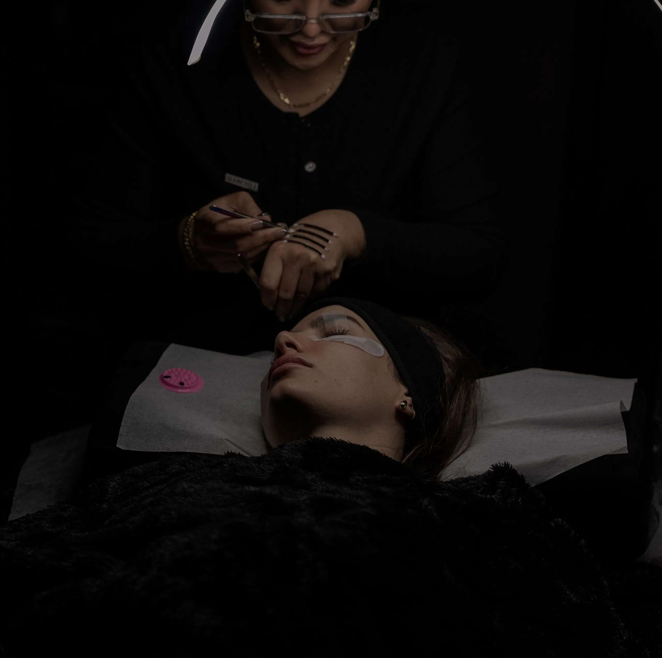 A lash artist applying extensions at the March14 Lashes and Brows Atelier
