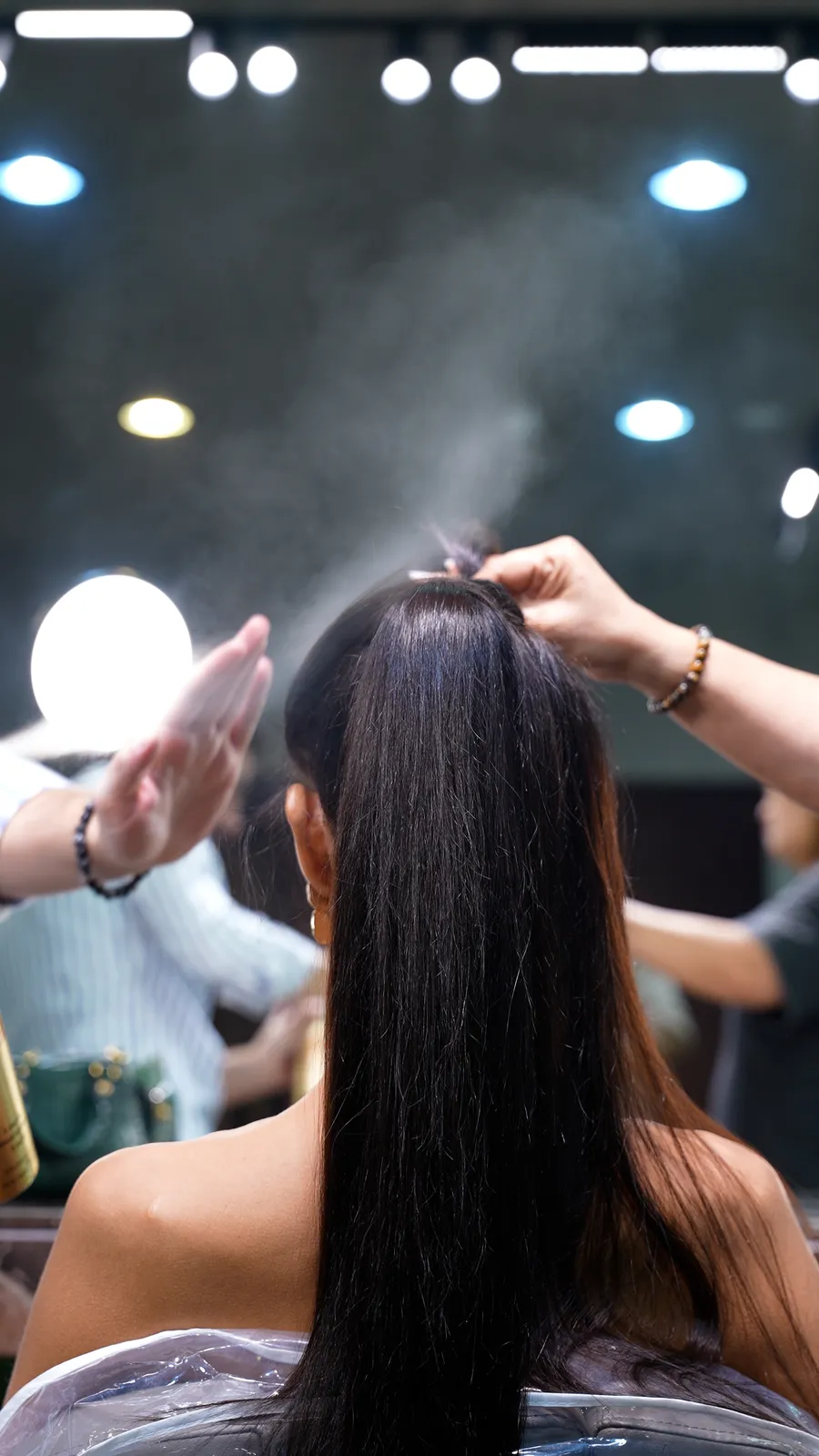 Backstage ponytail finish with fixing mist at March14 in Dubai