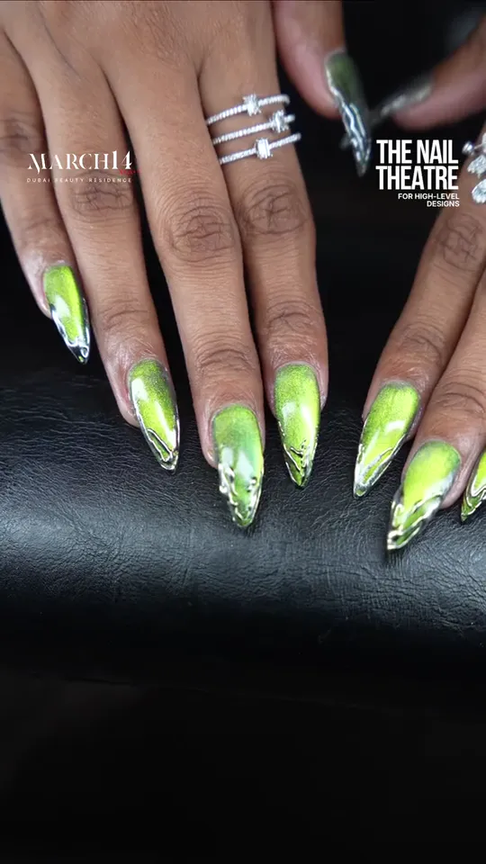 Neon and cat eye nail art at March14 in Dubai