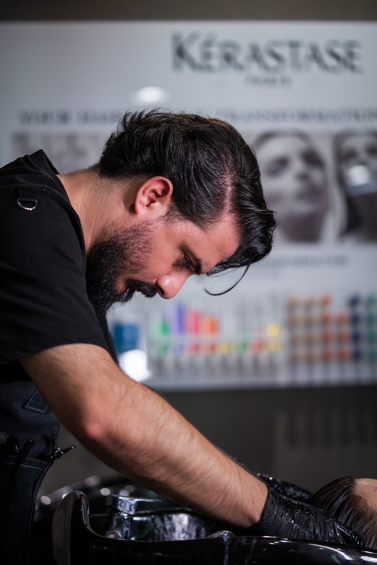 Celebrity hairdresser Essa Makhoul applying a Kérastase Fusio-Dose treatment at the March14 Kérastase Haircare Lab in Dubai