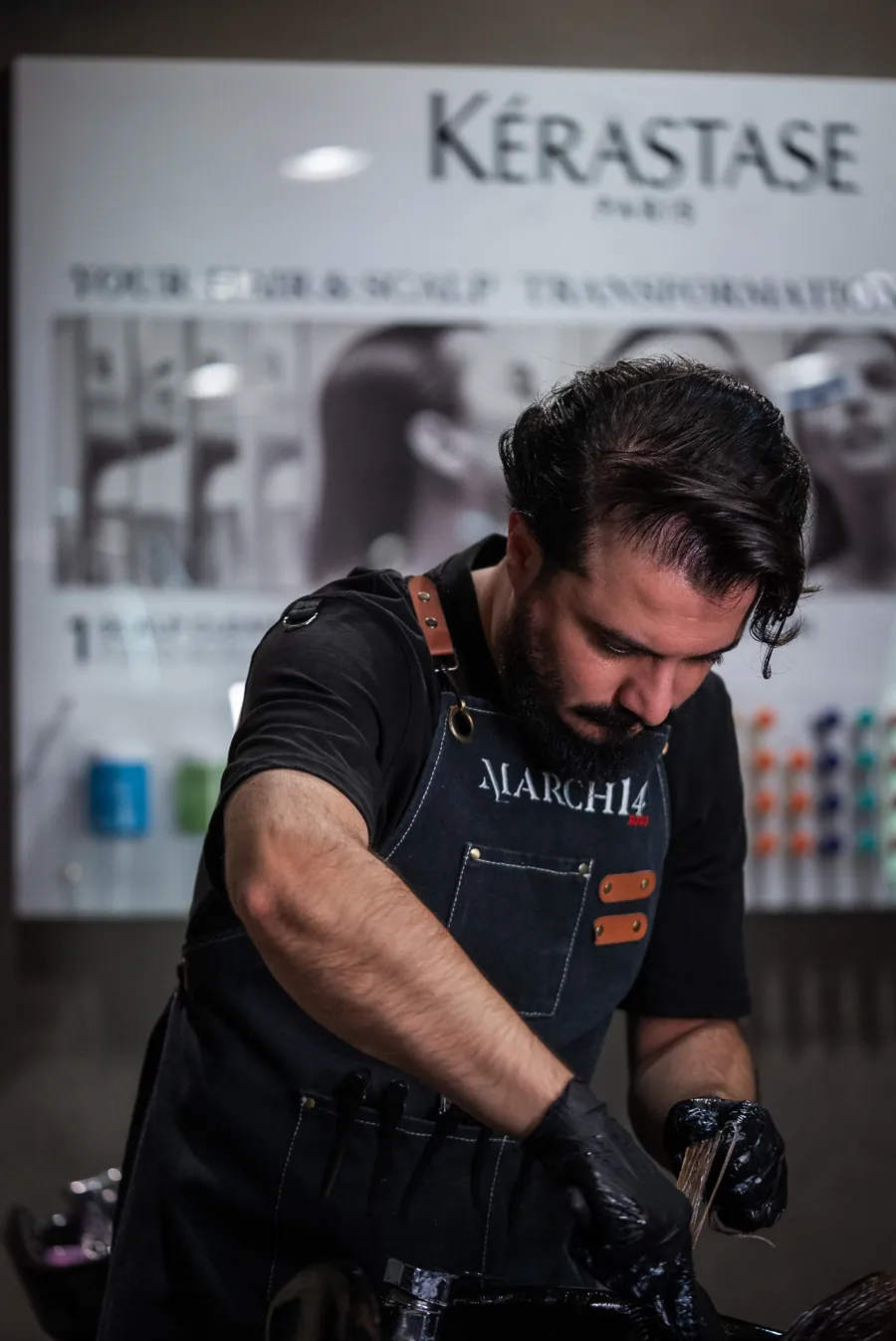 Essa Makhoul applying Kérastase care at the March14 Hair Studio