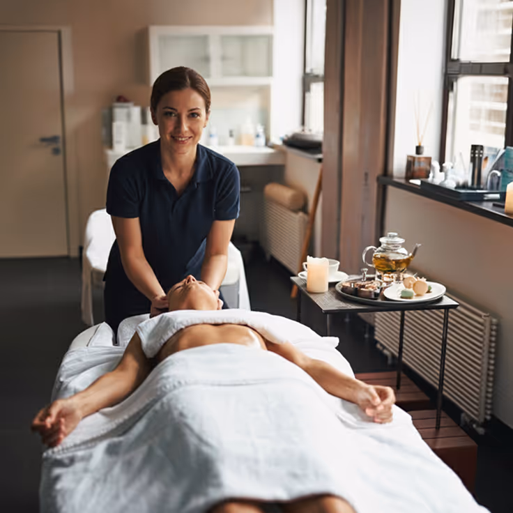 A lady getting a massage from a therapist