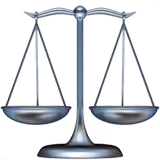 Balanza de equilibrio metálica con dos platillos colgantes.