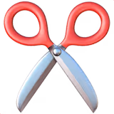 Para nożyczek z czerwonymi plastikowymi uchwytami i metalowymi ostrzami.