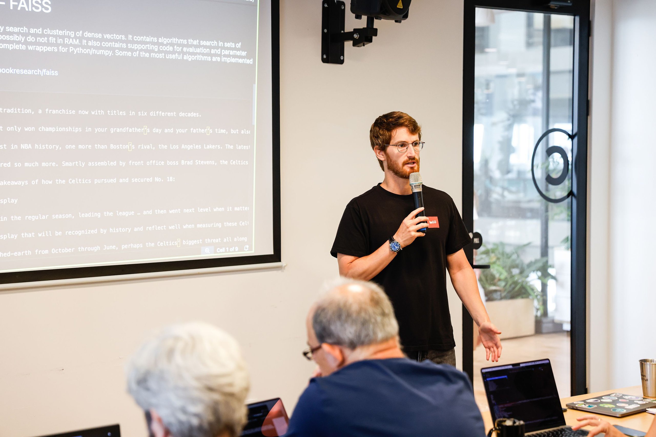 Developer workshop session with instructor demonstrating AI coding techniques