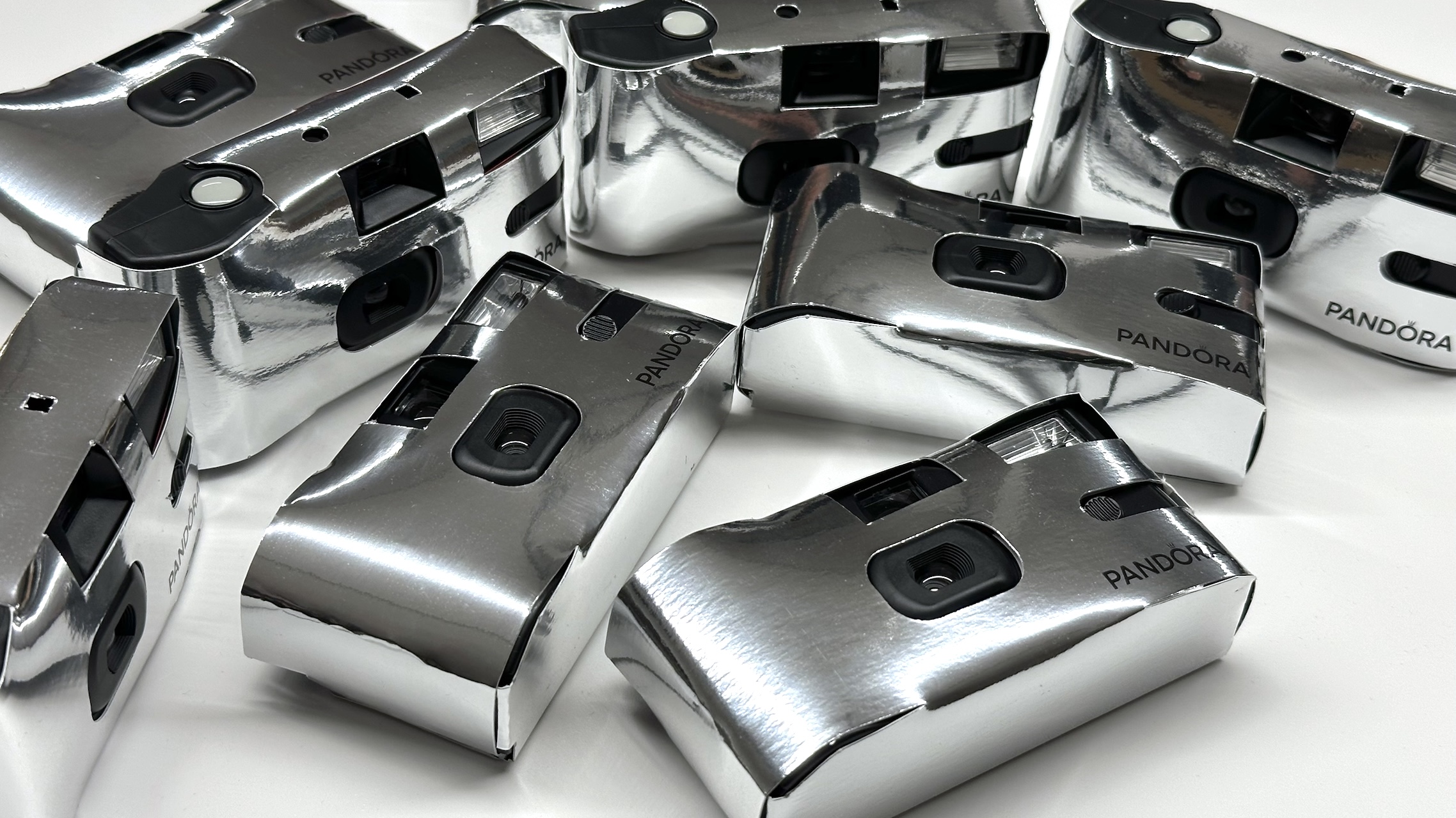 Branded paper case on disposable cameras for Pandora