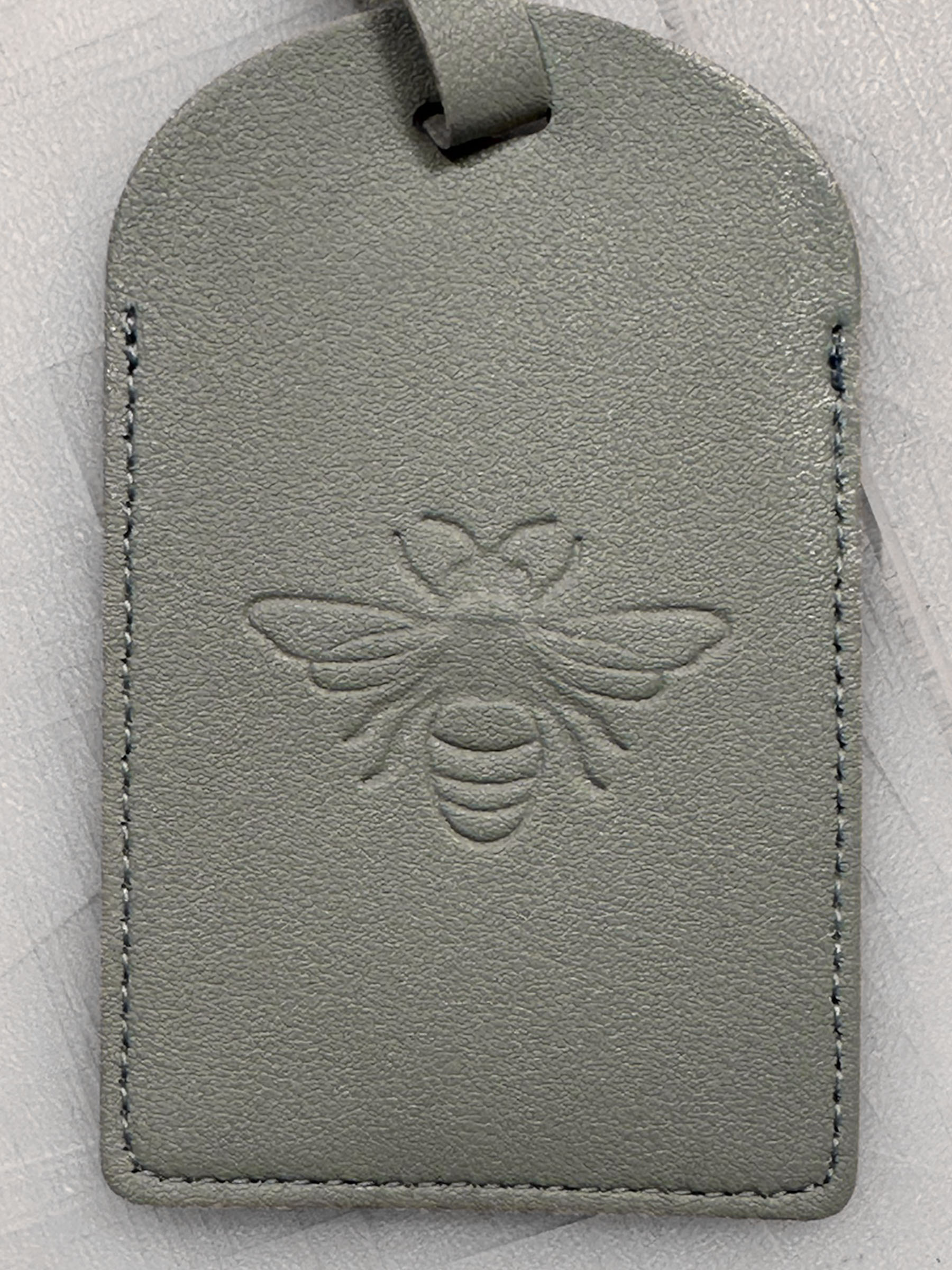 Personalised and debossed leather tag