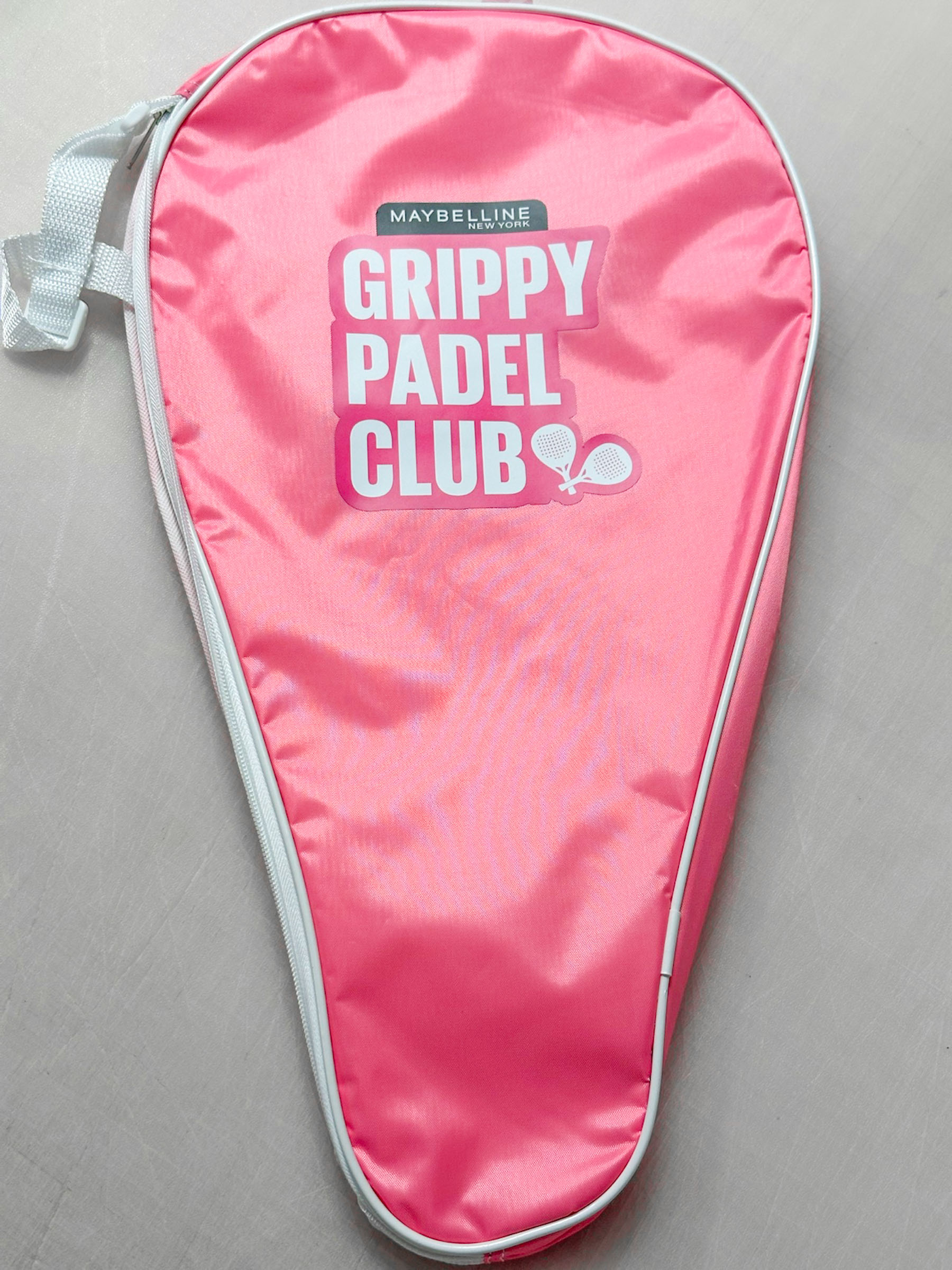 Branded paddle cover for Maybelline