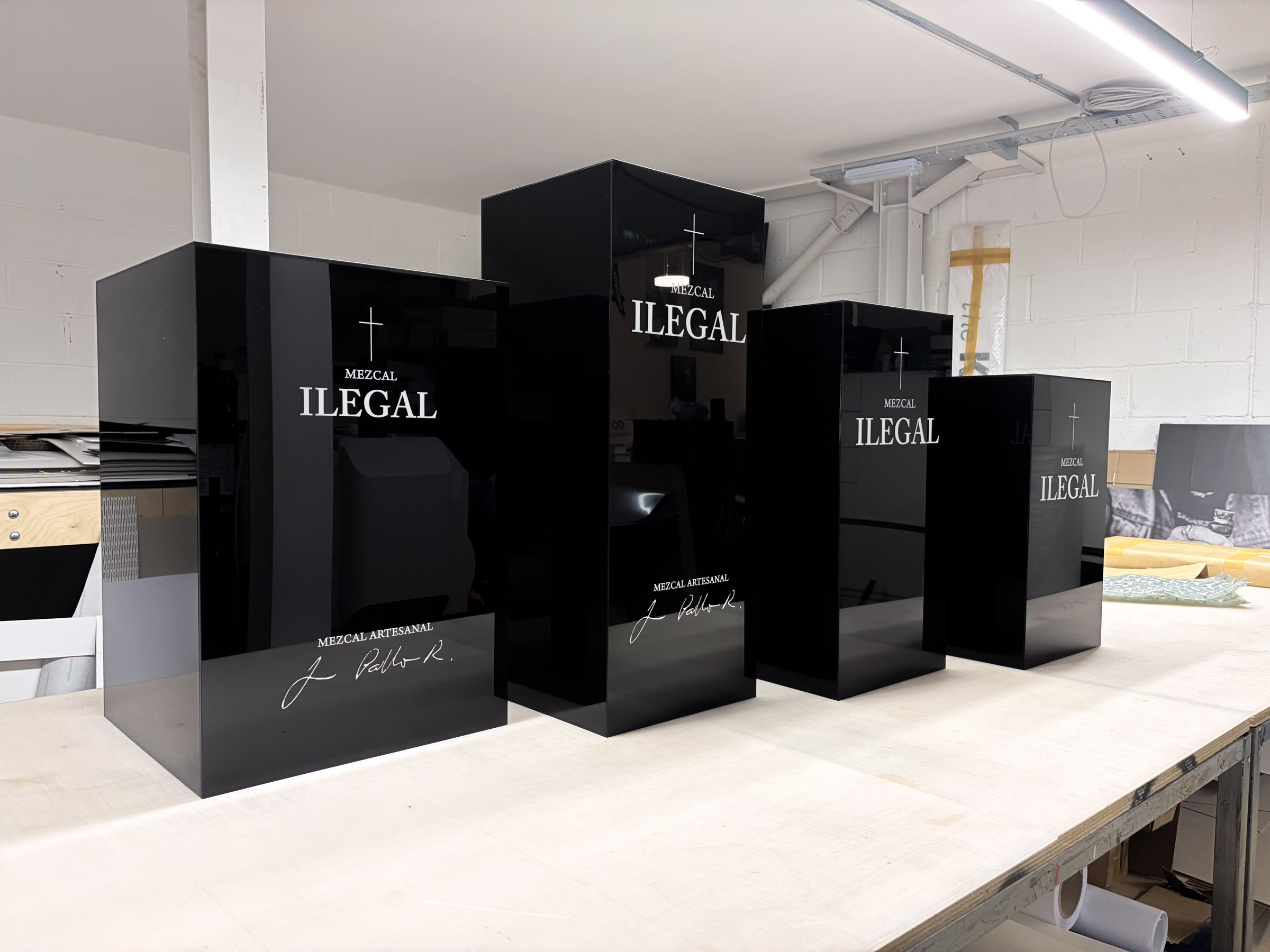 Custom high-gloss plinths made for display installations
