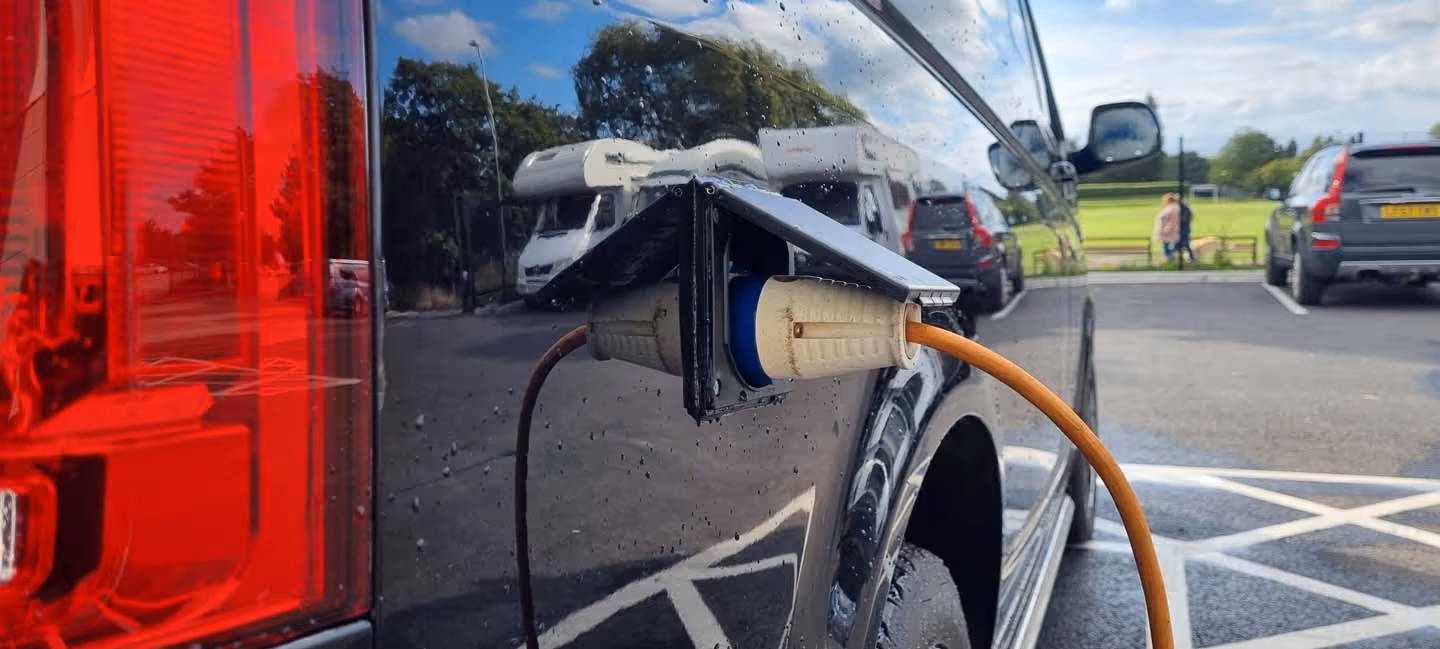 External electrical hookup connection on motorhome