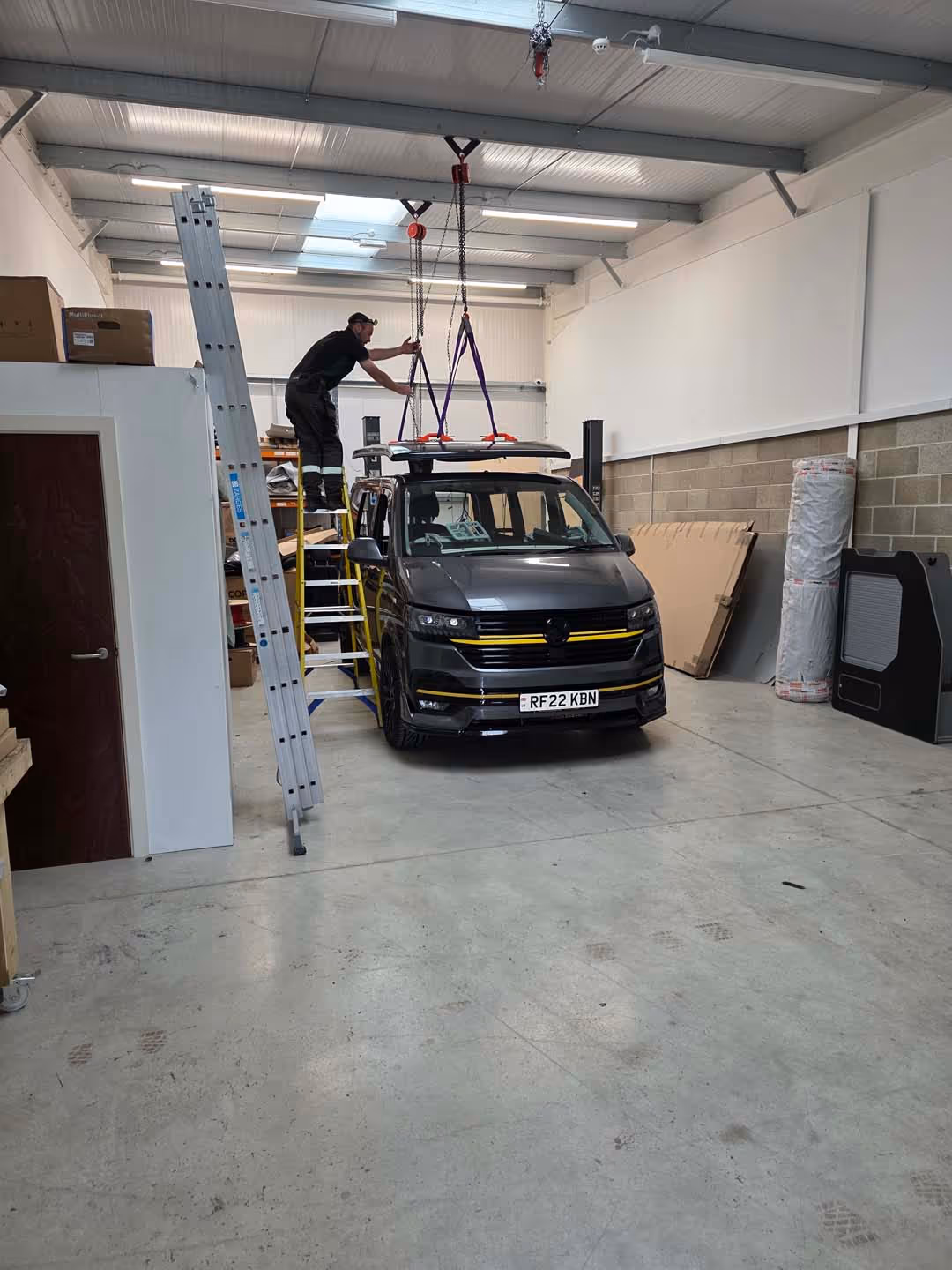 Motorhome electrical installation taking place inside workshop