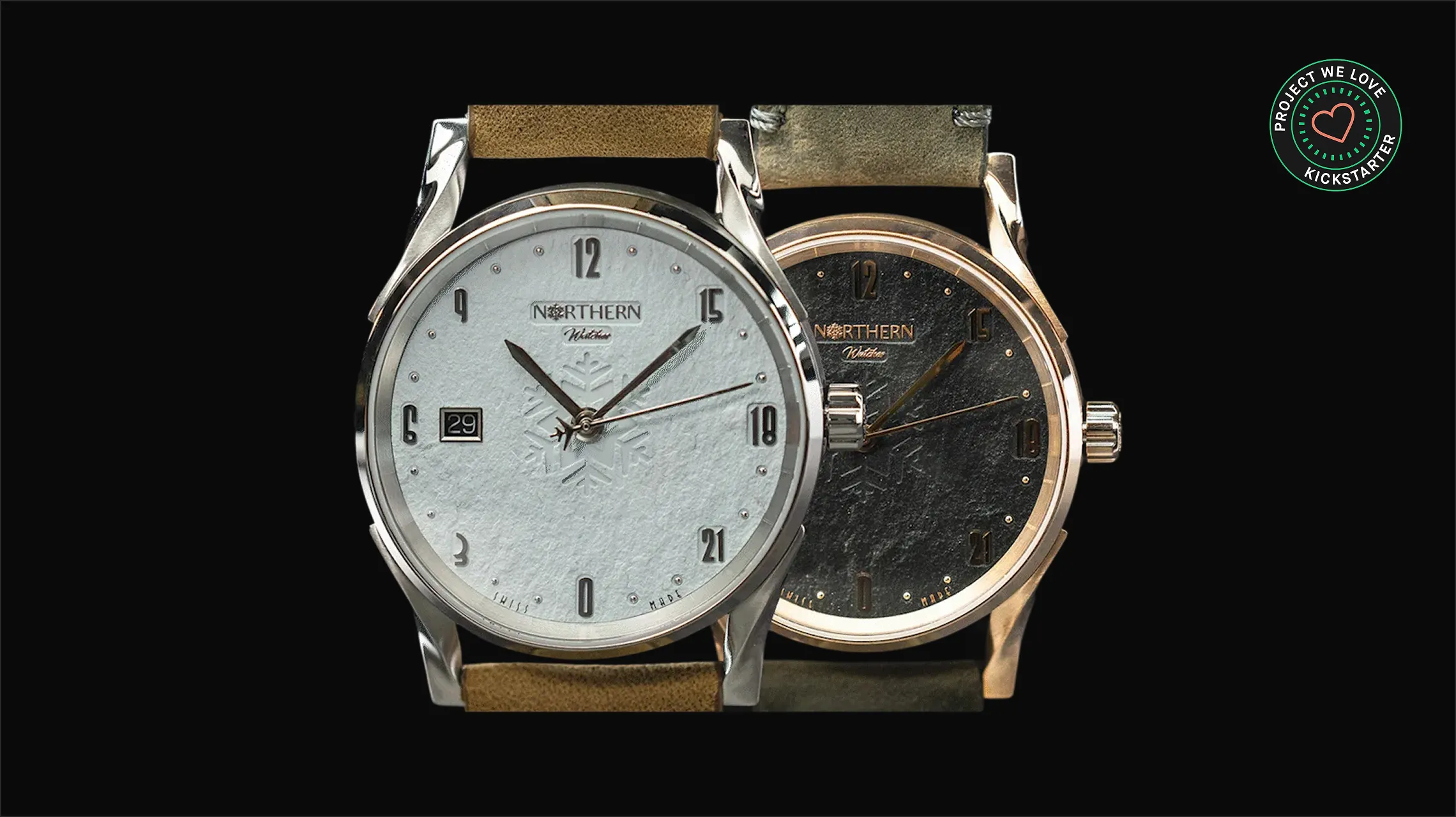 Two Northern Watches with textured dials, one in white with silver case and one in black with bronze case, both on leather straps.