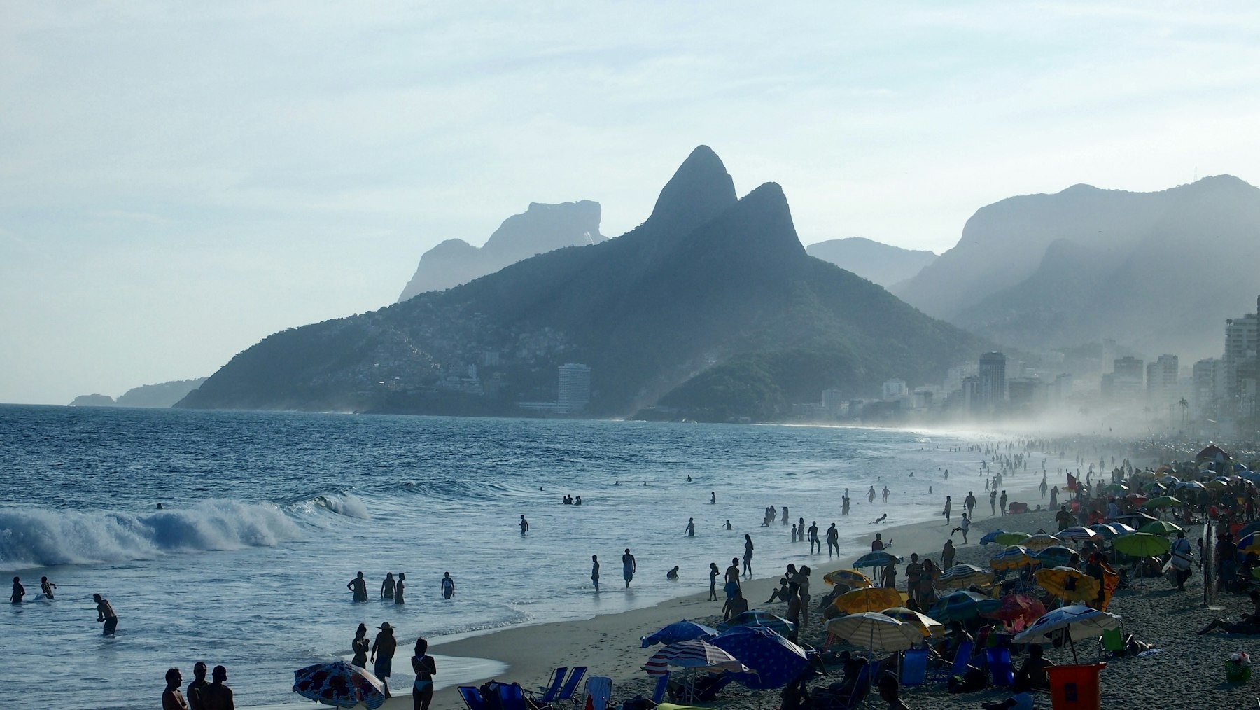 Ipanema beach in Rio de Janeiro with the Dois Irmãos hills behind