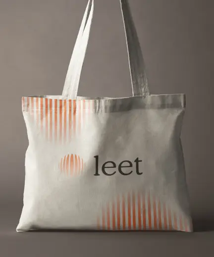 Leet Pharma tote bag design — brand merchandise application with organic logotype and terracotta colour palette