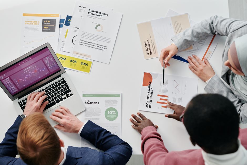 Standardized NAIC regulatory documentation and annual statement filing folders on a professional desk