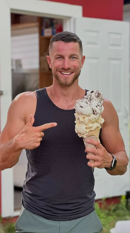 Fitness coach Kyle enjoying a ice-cream while maintaining balance and a sustainable fitness lifestyle
