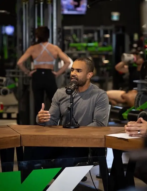 Corey talking about health and fitness on a podcast