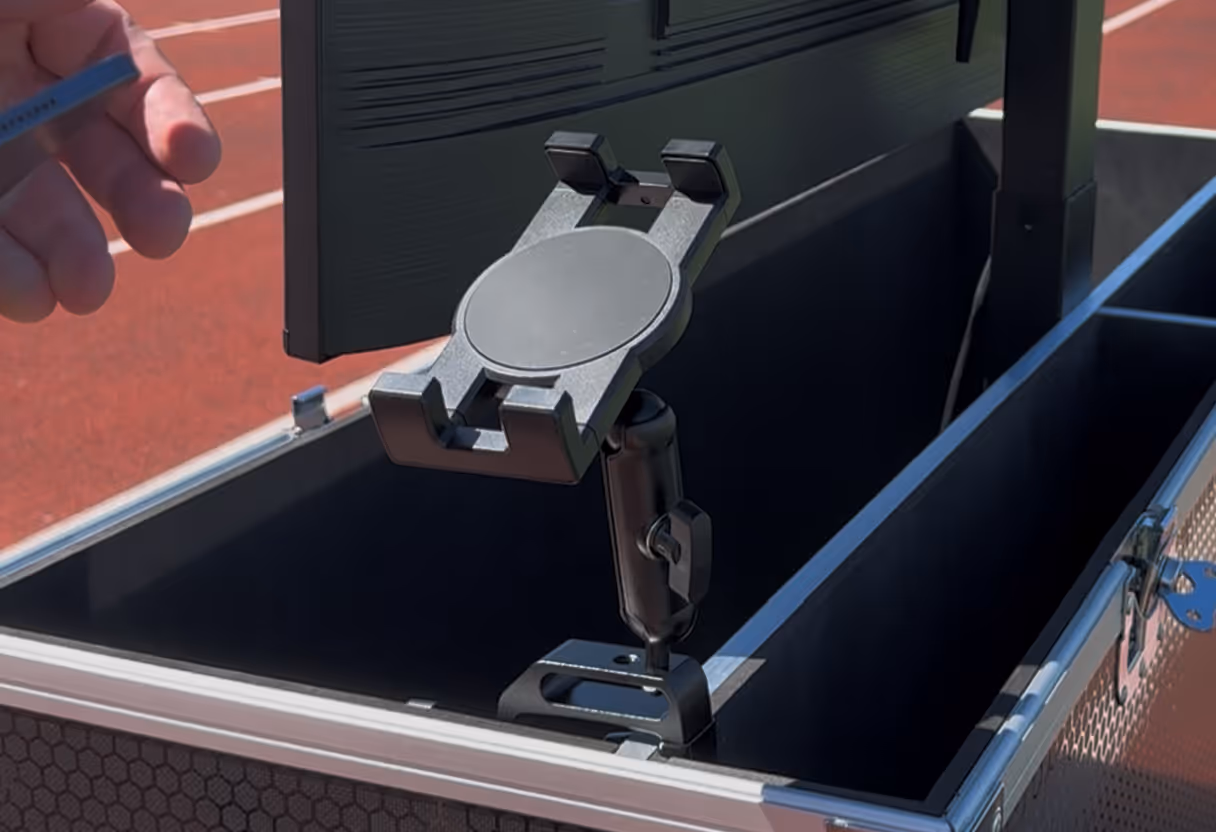 Adjustable iPad holder mounted on the inside a sideline TV box, great for holding your Hudl Sideline iPad during the game to quickly show your players instant replays.