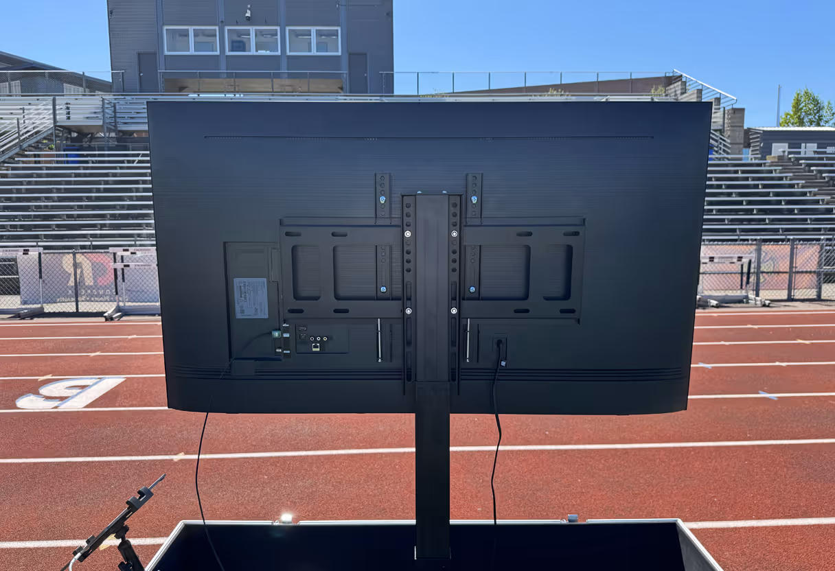 Large, sideline instant replay TV box.