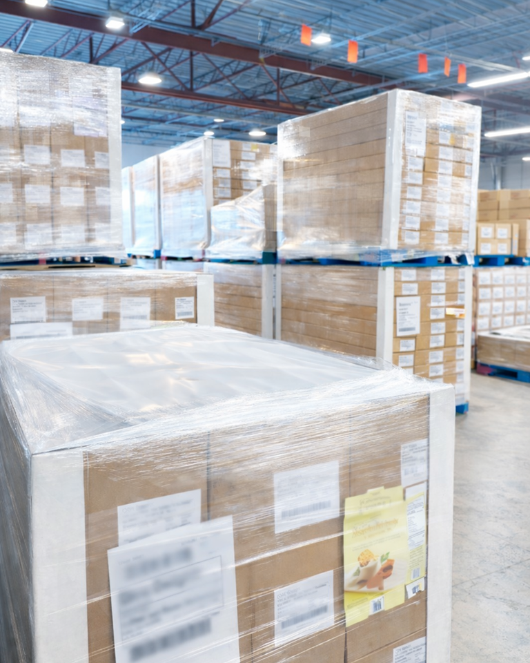 An image of packaged material in a warehouse.