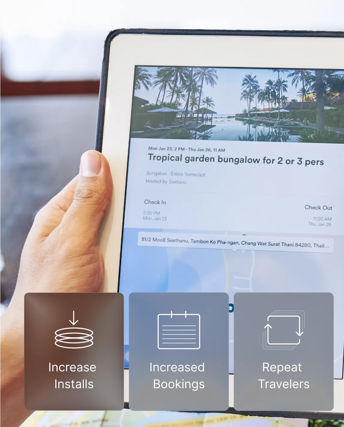 Hand holding tablet showing travel app with Increase Installs, Increased Bookings and Repeat Travelers