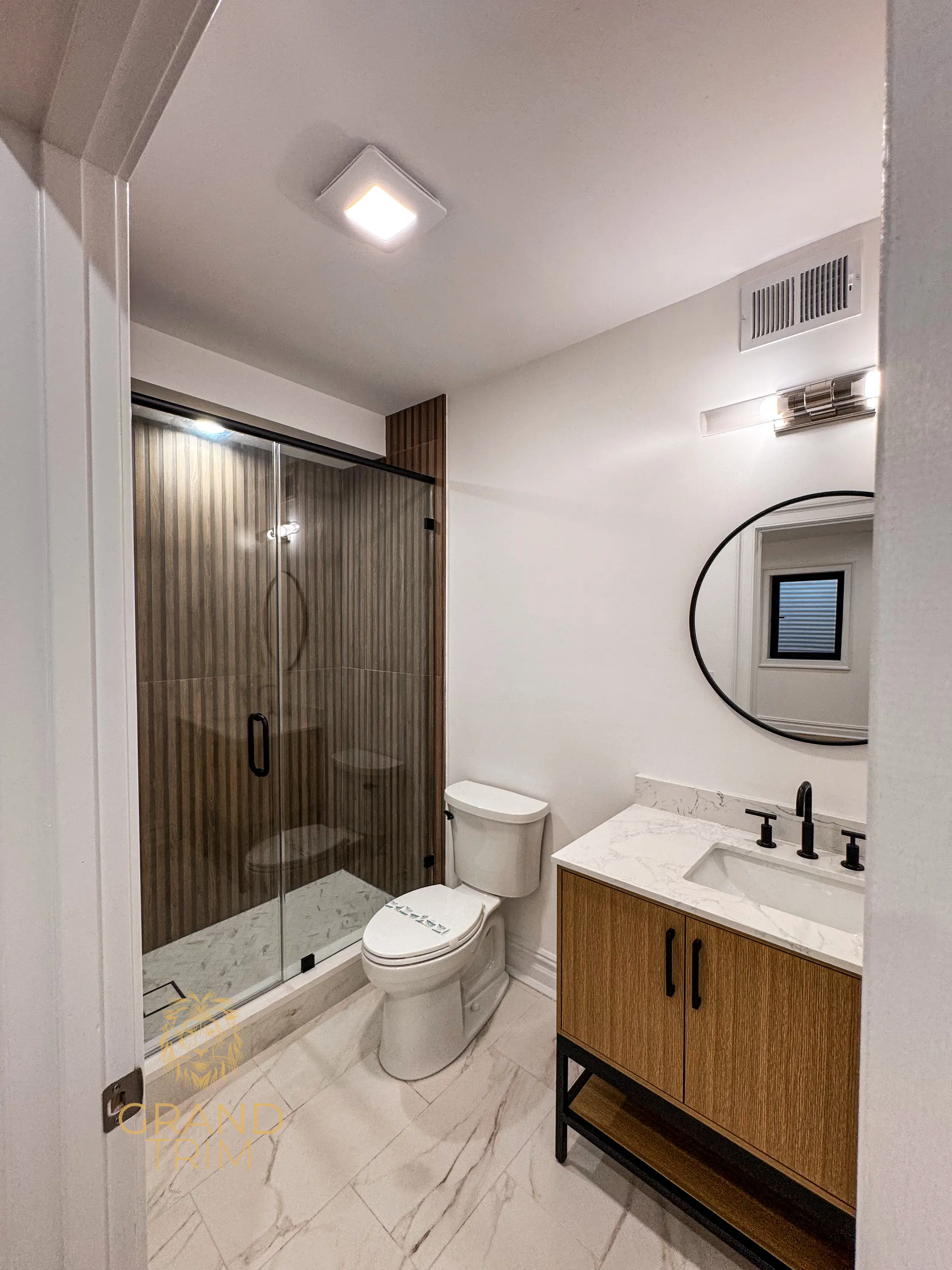 Vertical wooden slat wall paneling in a modern New Jersey bathroom shower