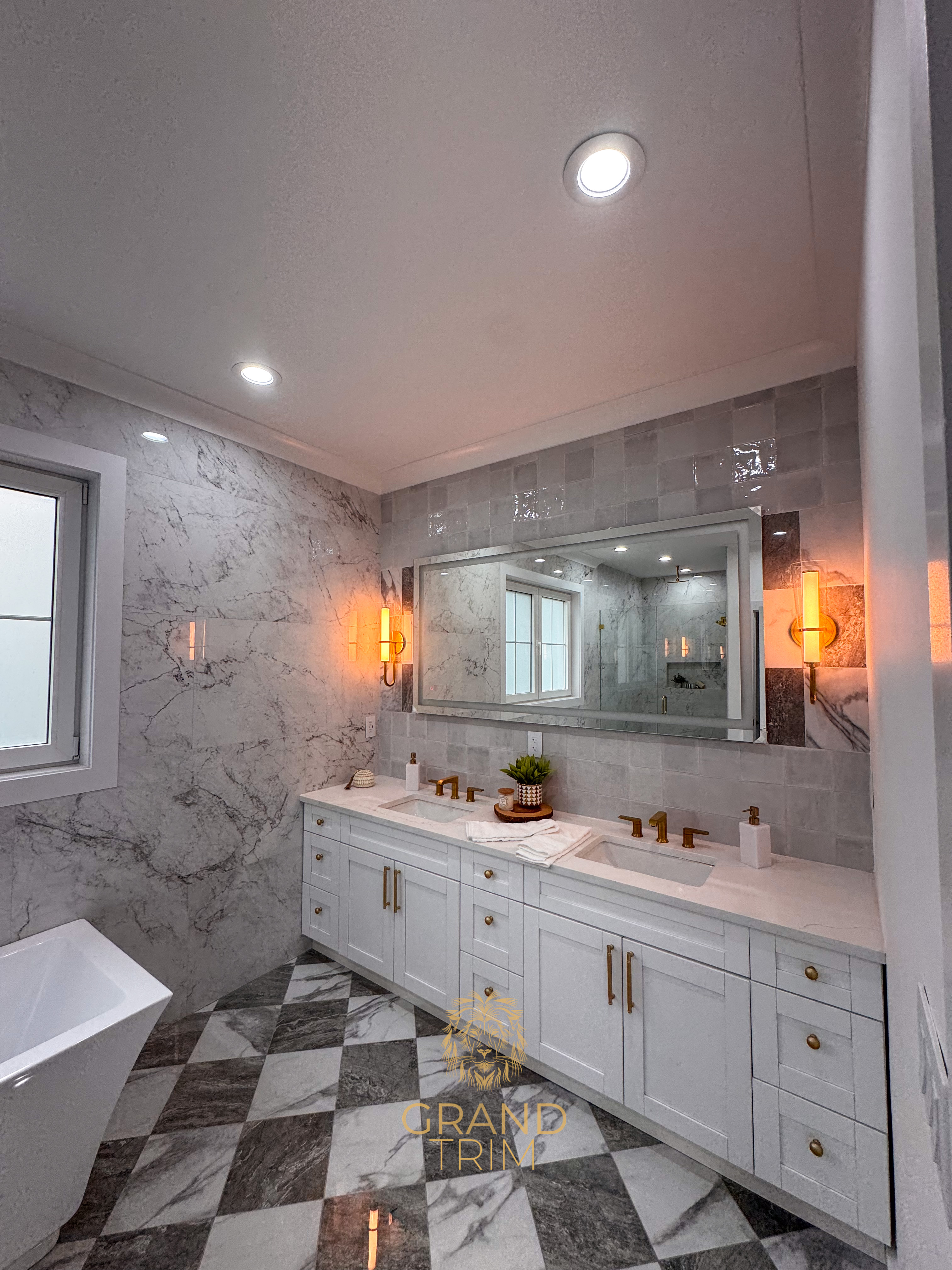White crown molding and window trim in a luxurious New Jersey bathroom