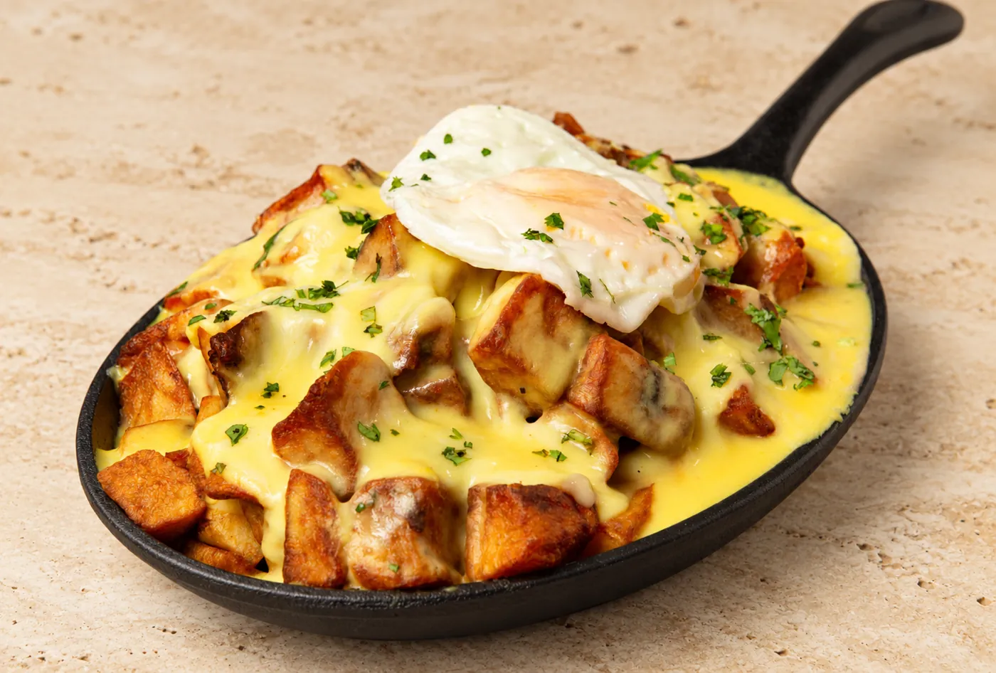 Poêlon de pommes de terre gratinées à l'œuf, Le Carré Noir
