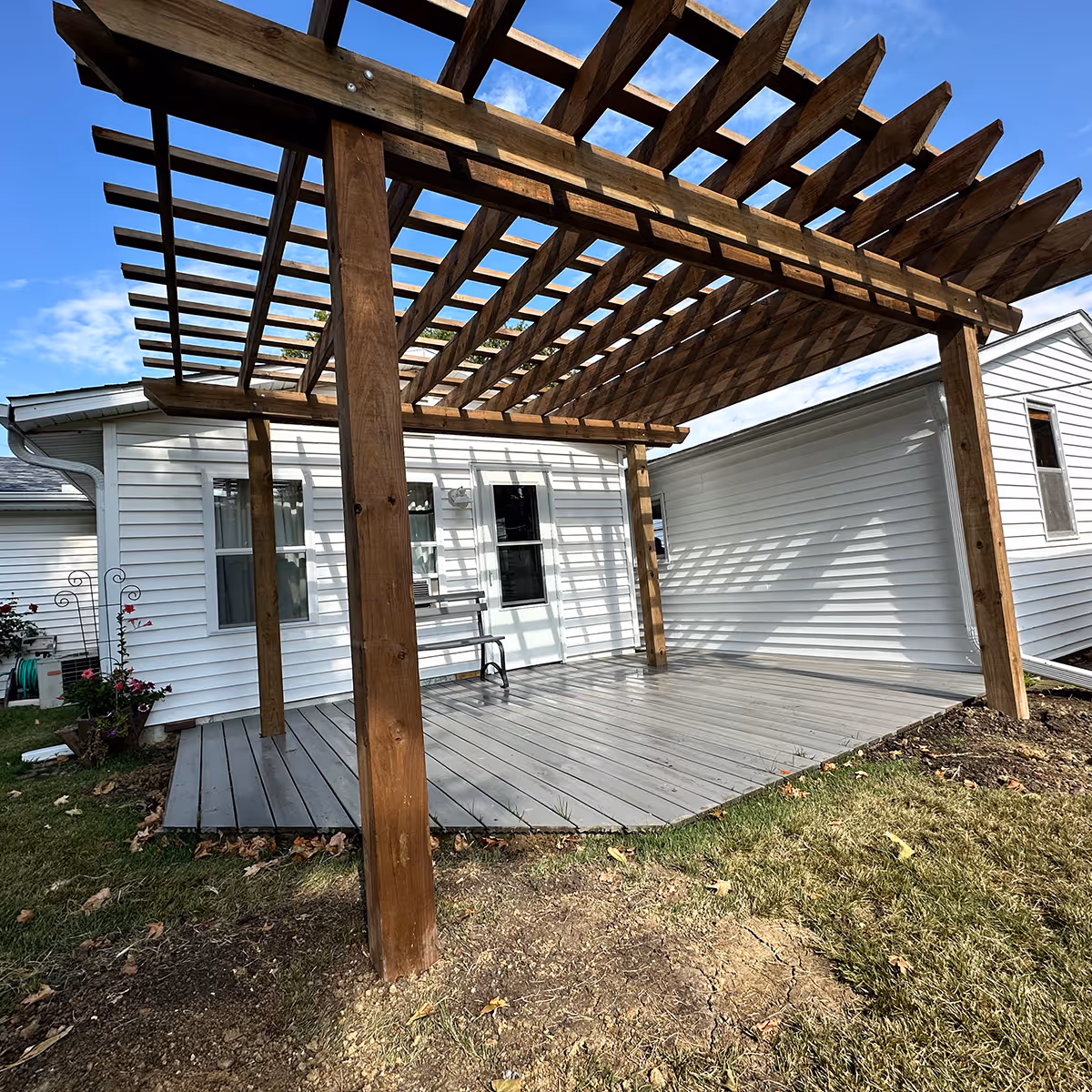 custom wood pergola installation by Midwest Lawns LLC in Bushnell, IL