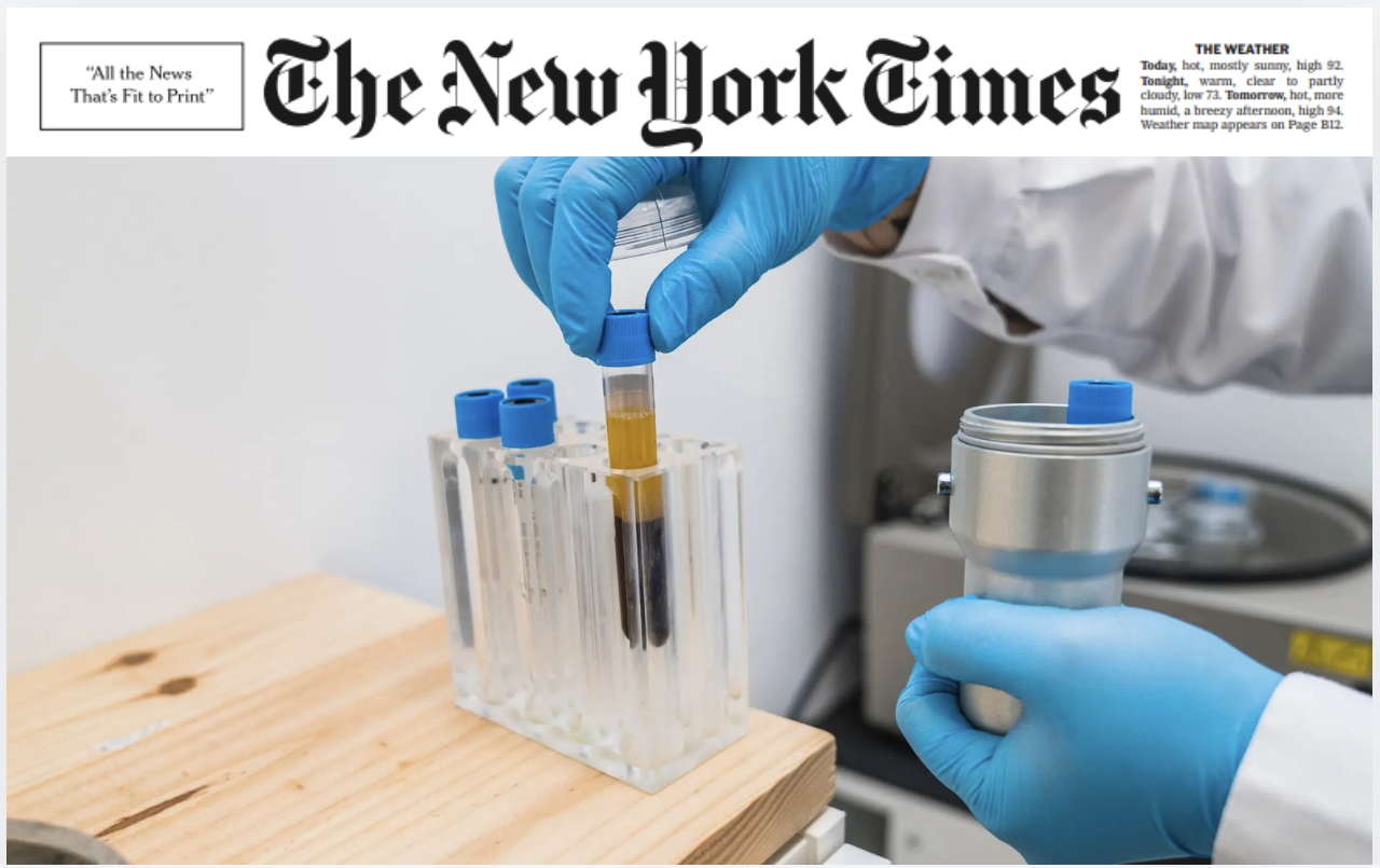A researcher handles a sample.