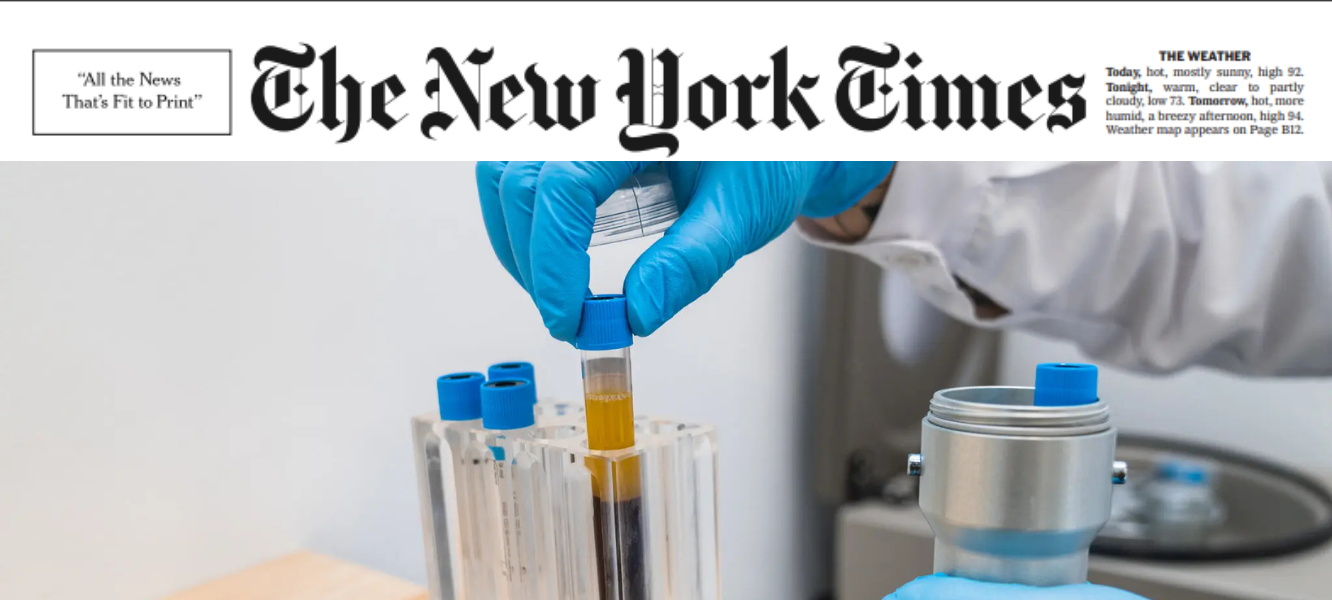 A researcher handles a sample.